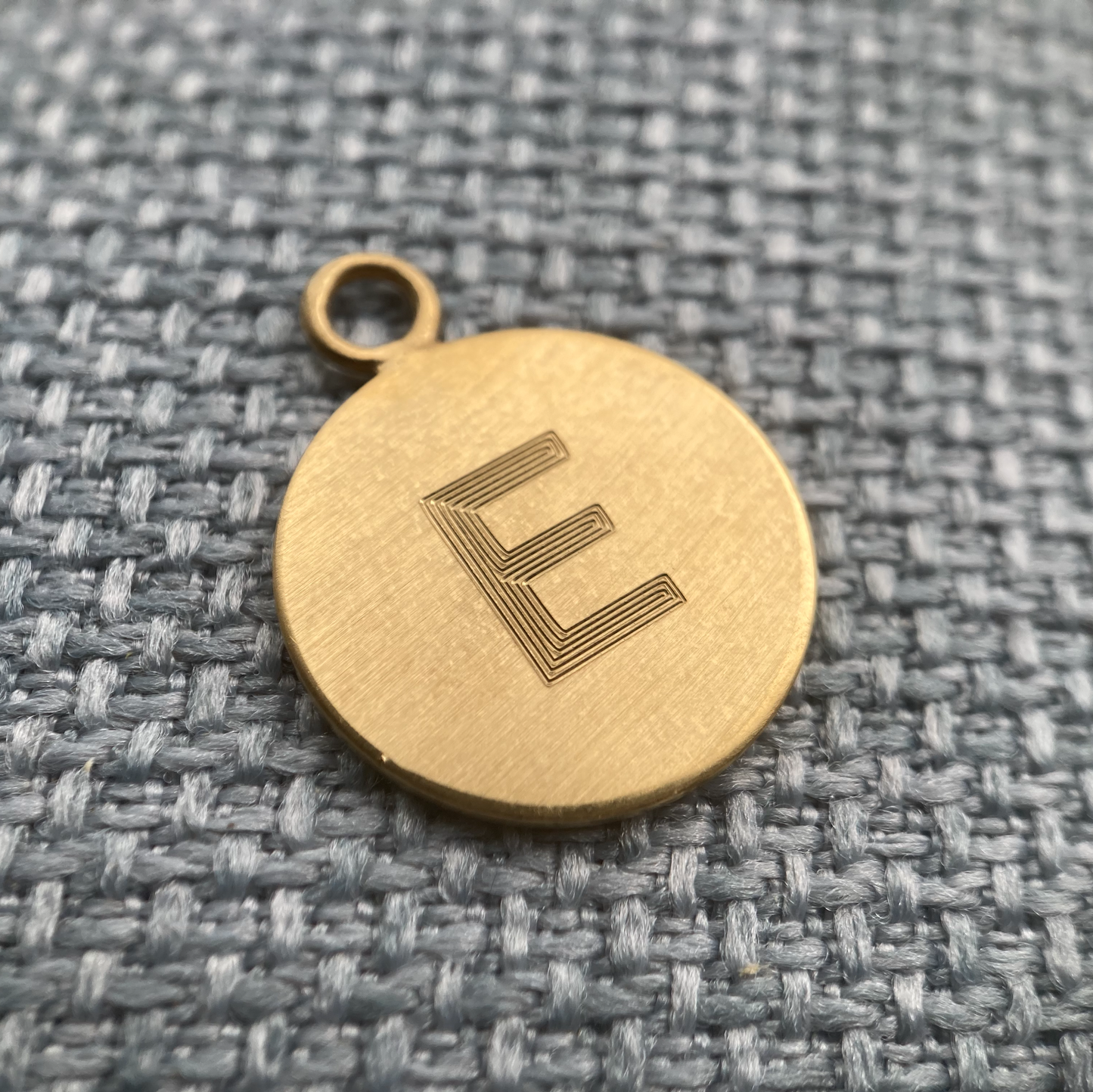 Earring with single letter